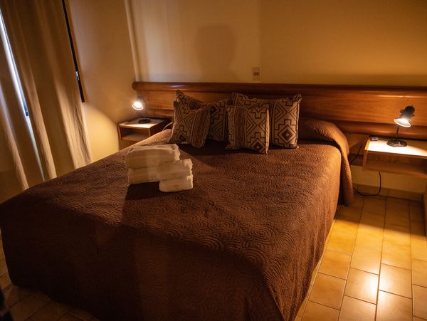 cama king size para dos personas en el valle grande hotel de montaña