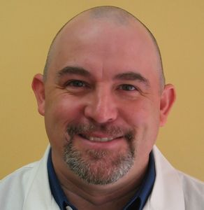 Eddie Kraft fits hearing aids in Billings