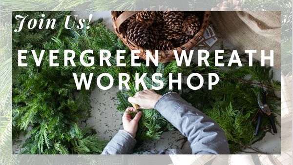 Hands making an evergreen wreath with pinecones and greens.