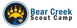 Logo of Bear Creek Scout Camp featuring a bear paw and a creek.