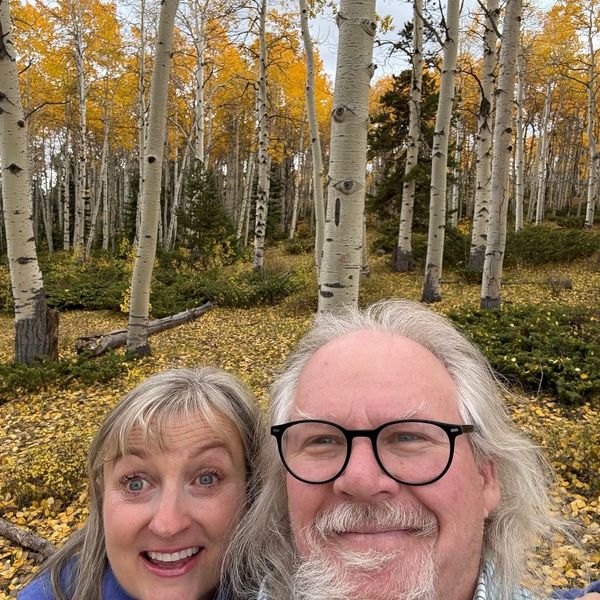 Smiling couple in the forest