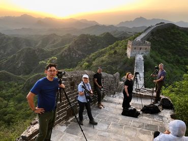 Sunset photography shoot at the wild part of the Great Wall, China. We have the whole wall to ourse
