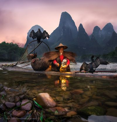 The cormorants and the fisherman in Guilin / Yangshuo by the Li River