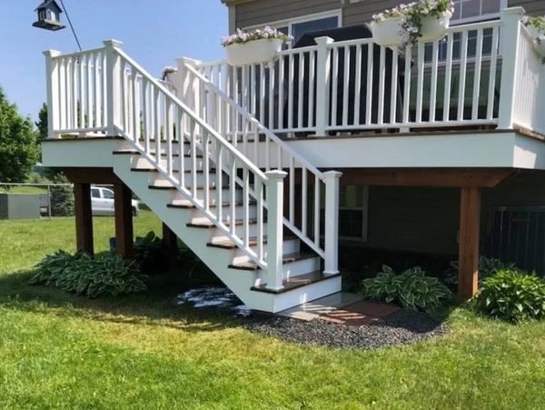 New deck with new stairs and banisters.