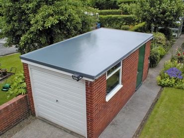 This detached garage was leaking water via the existing roof and required a full GRP replacement