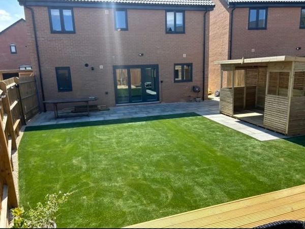 Artificial lawn and summer house