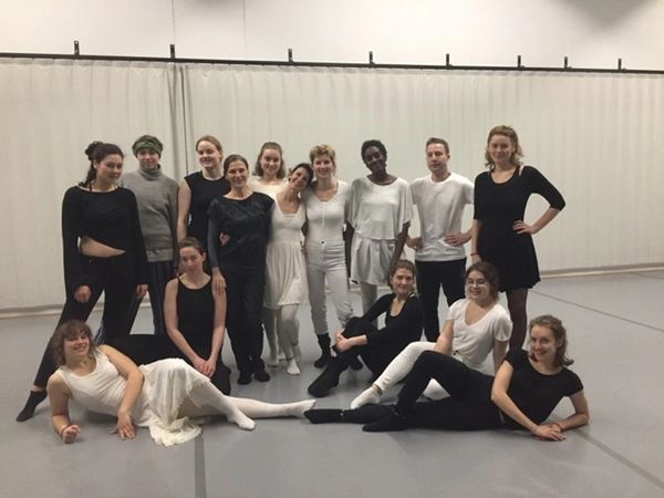 A group of young adults, including the same woman (likely an instructor/choreographer