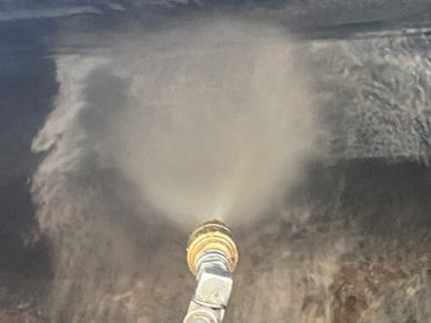 cleaning of a commercial wheelie bin