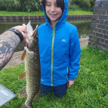 Hugh with another great spectrum catch. This pike was caught while lure fishing techniques learned a