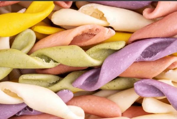 Colorful twisted pasta shells.