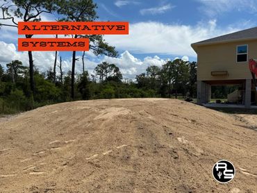 Raised septic mound system installed for homes with poor soil drainage