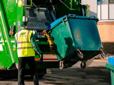 General Waste bin being loaded onto a dustcart in Redhill.