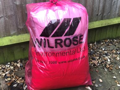 waste sack full and awaiting collection by wilrose.