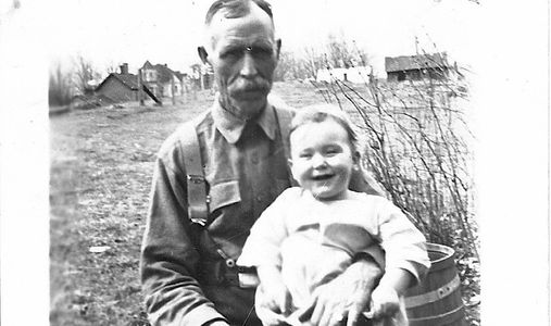 Walter Waldron author Gloria Waldron Hukle great grandfather with his grandson on his lap.