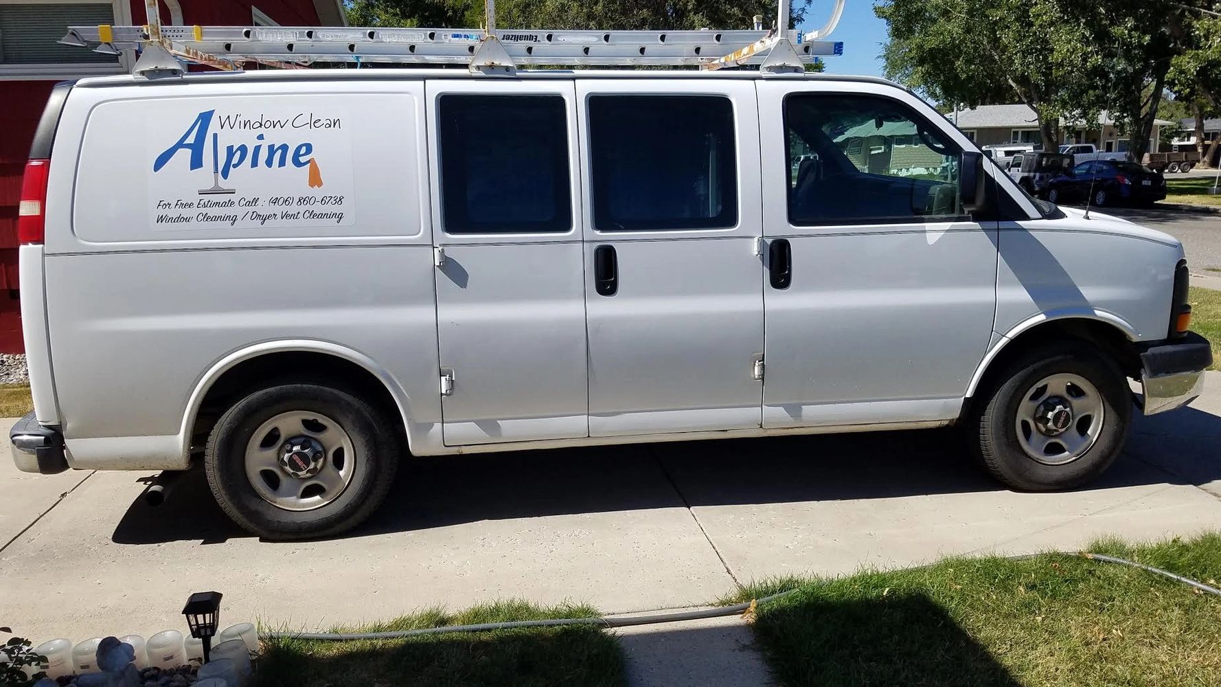 Photo of van with Alpine Window Clean logo.