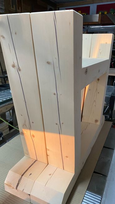 Epoxy filled cracks on this reclaimed wood makes for a unique feature for table legs to display.