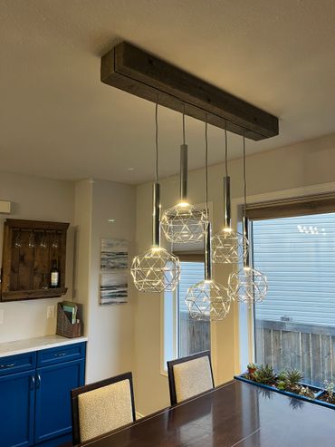 A touch of rustic adds to this classy space. 4x6 rustic timber reclaimed from a church bell tower.