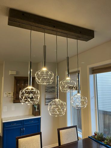 A reclaimed 4x6 transformed into a light fixture in an Edmonton kitchen.