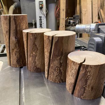 Tamarack round posts cut for a display to hang glasses on at the eye doctor's.