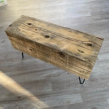 12x12 bench with hairpin legs. Long cracks and knots present a rustic appearance.
