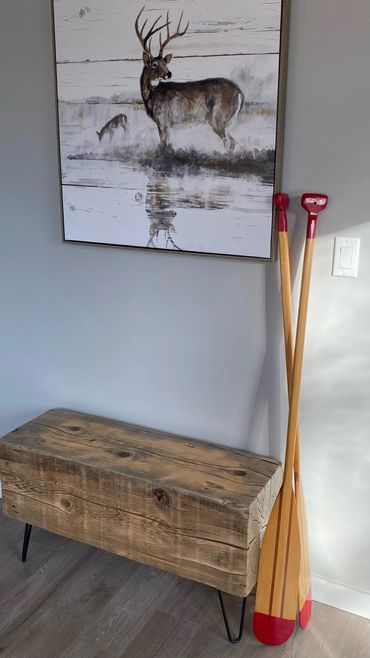 A piece of 12x12 stabilized with dowels from the bottom, sanded and clear coat with hairpin legs.