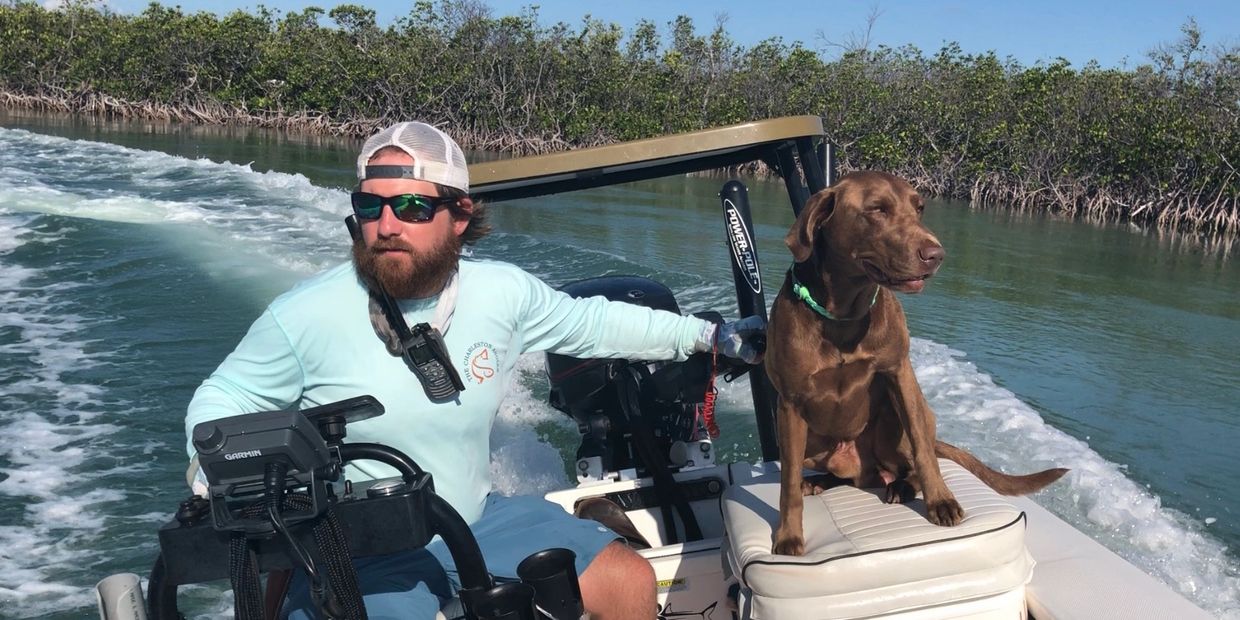 guide and dog headed fishing