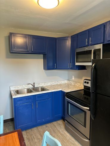 Roomy Kitchenette with 3 full size beds rooms 65 & 66