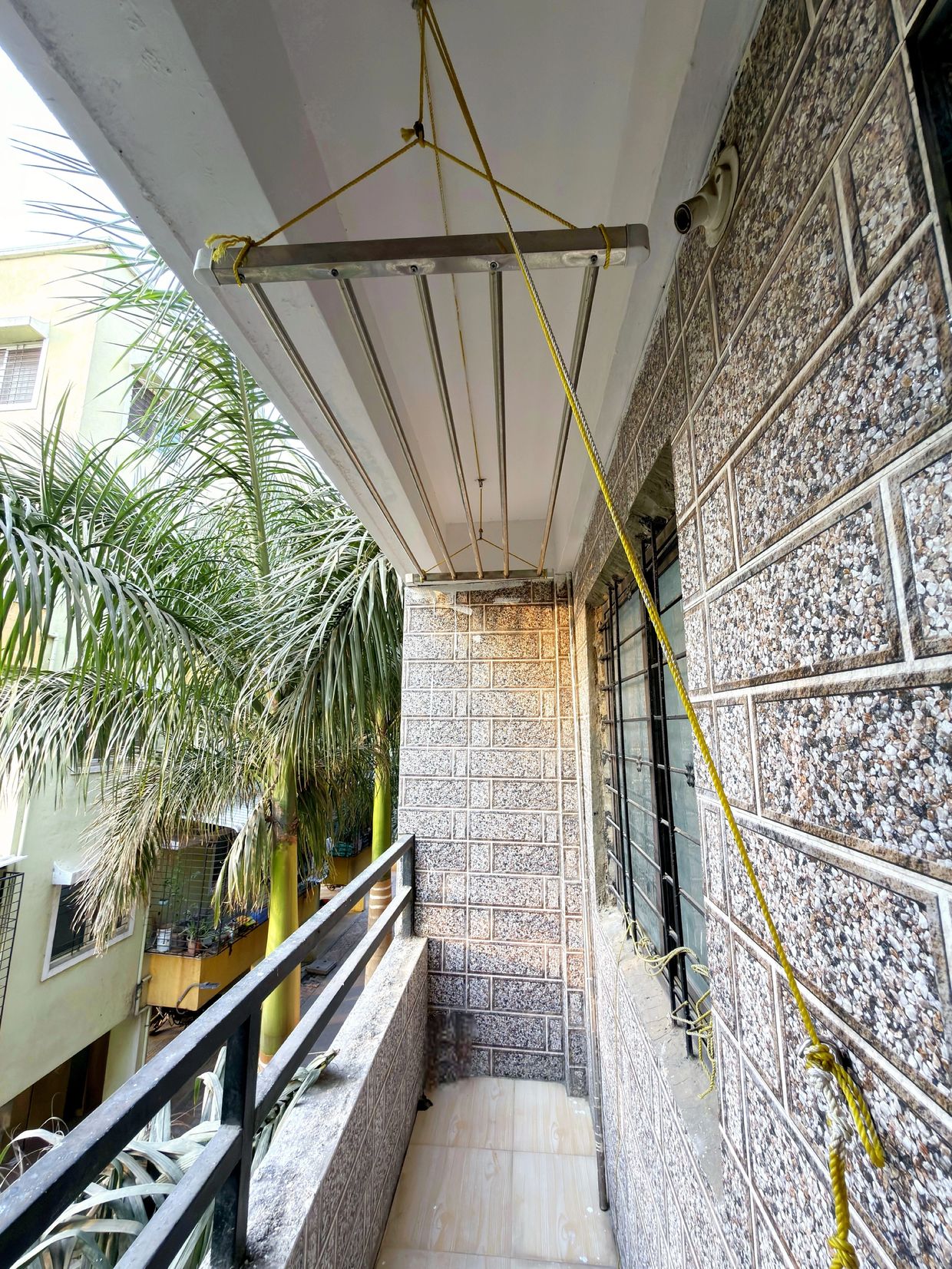 Balcony area in PG in Chakan with ventilation and open space for residents