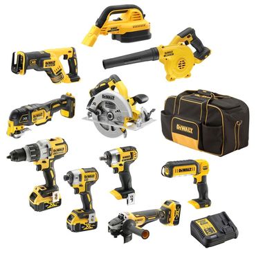 A set of yellow and black DeWalt power tools with a carrying bag and charger.
