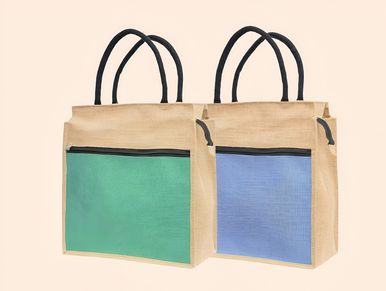 Two eco-friendly jute bags with colored front pockets and black handles.