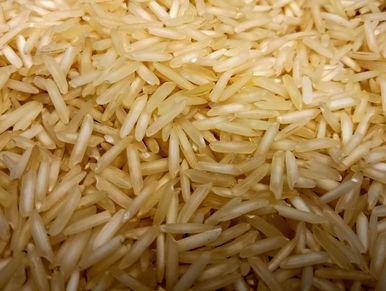 Close-up view of uncooked basmati rice grains.