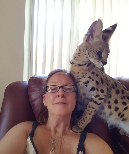 Me with my loving serval Artemis 