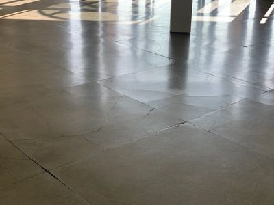 Cracked polished concrete finish floor, Northern California. Photo by Liz O'Sullivan.