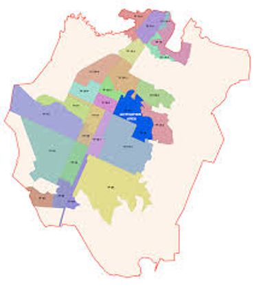 A colorful map showing various labeled regions within a boundary.