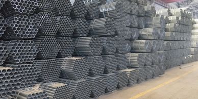 A BUNDLE OF GALVANIZED IRON PIPE