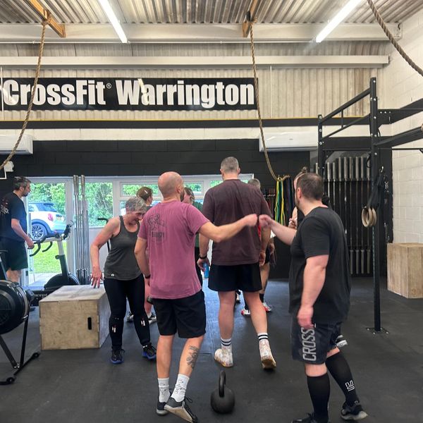 gym-wall-rack-pullup-rings-athlete
