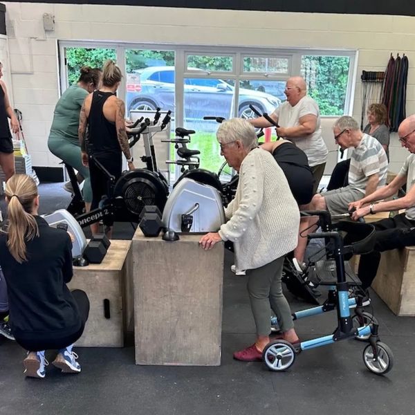 group-fitness-session-gym-natural-light