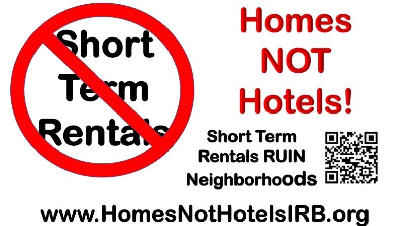 Homes Not Hotels Sign