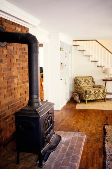 Relax by the wood burning stove, perfect for cool mountain nights.