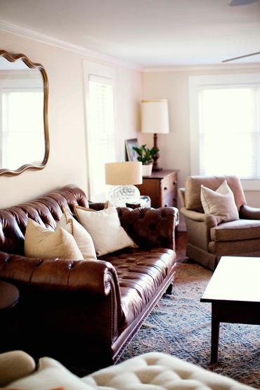 Comfortable living space complete with wood burning stove.