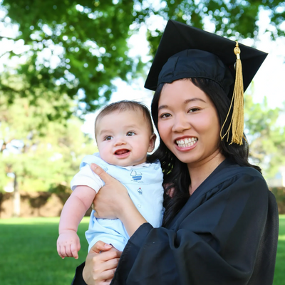Student Parent on Graduation Day with baby