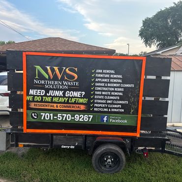 Sign for Northern Waste Solution junk removal services.