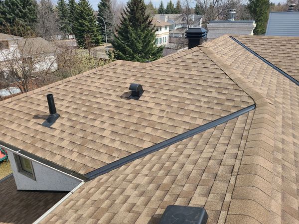 GAF Timberline HDZ in Shakewood with Maximum Ventilation VMAX-303 vent for enhanced attic airflow.