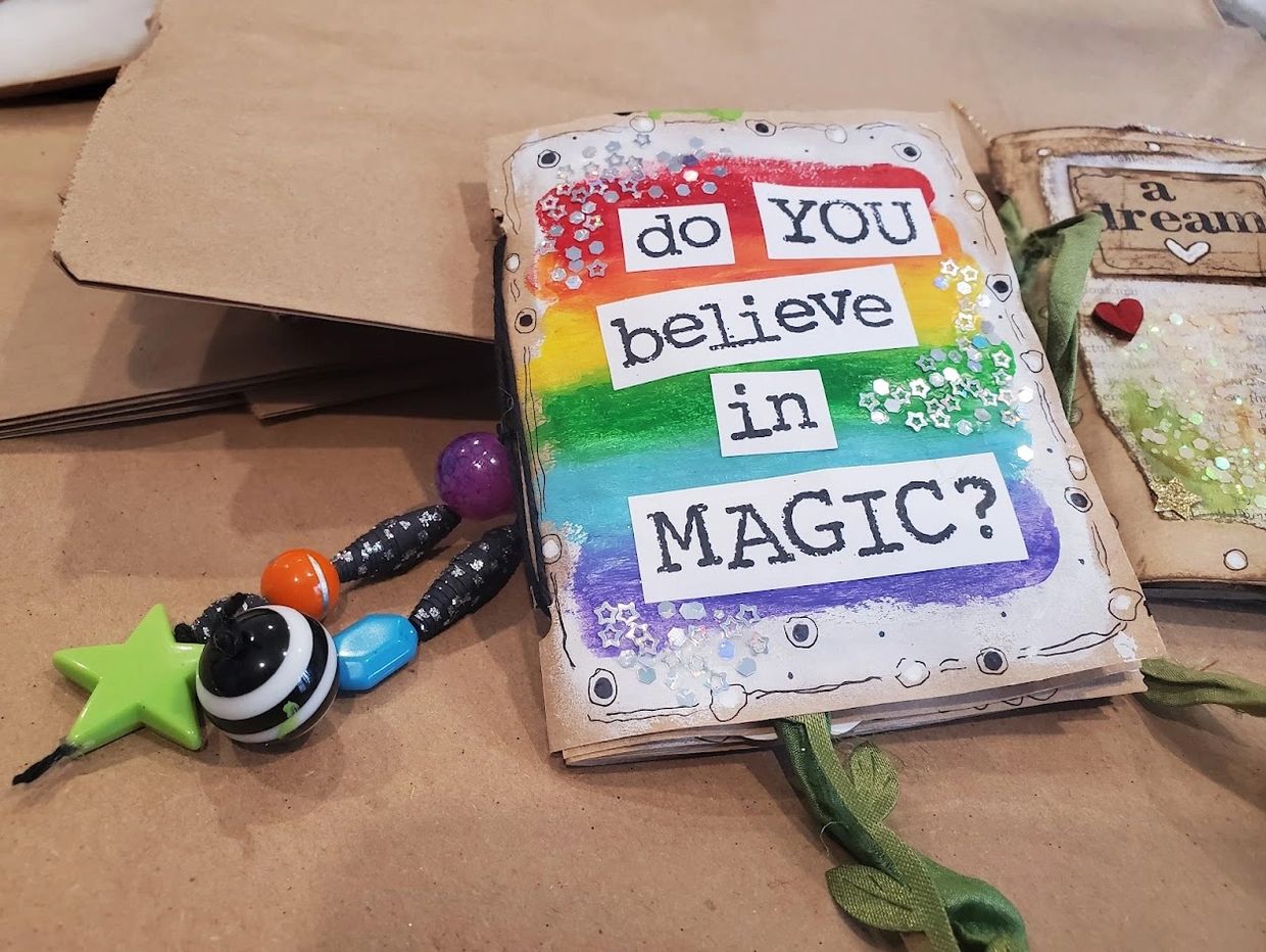 Colorful handmade booklet asking "Do you believe in MAGIC?"