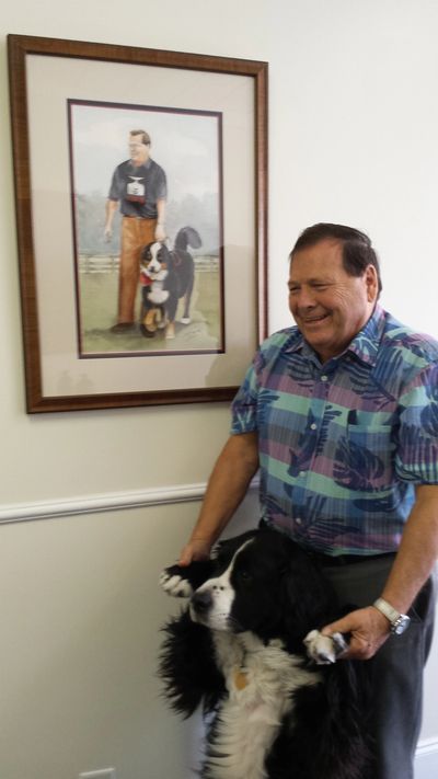 Robert A. Baille with his guide dog DJ.
