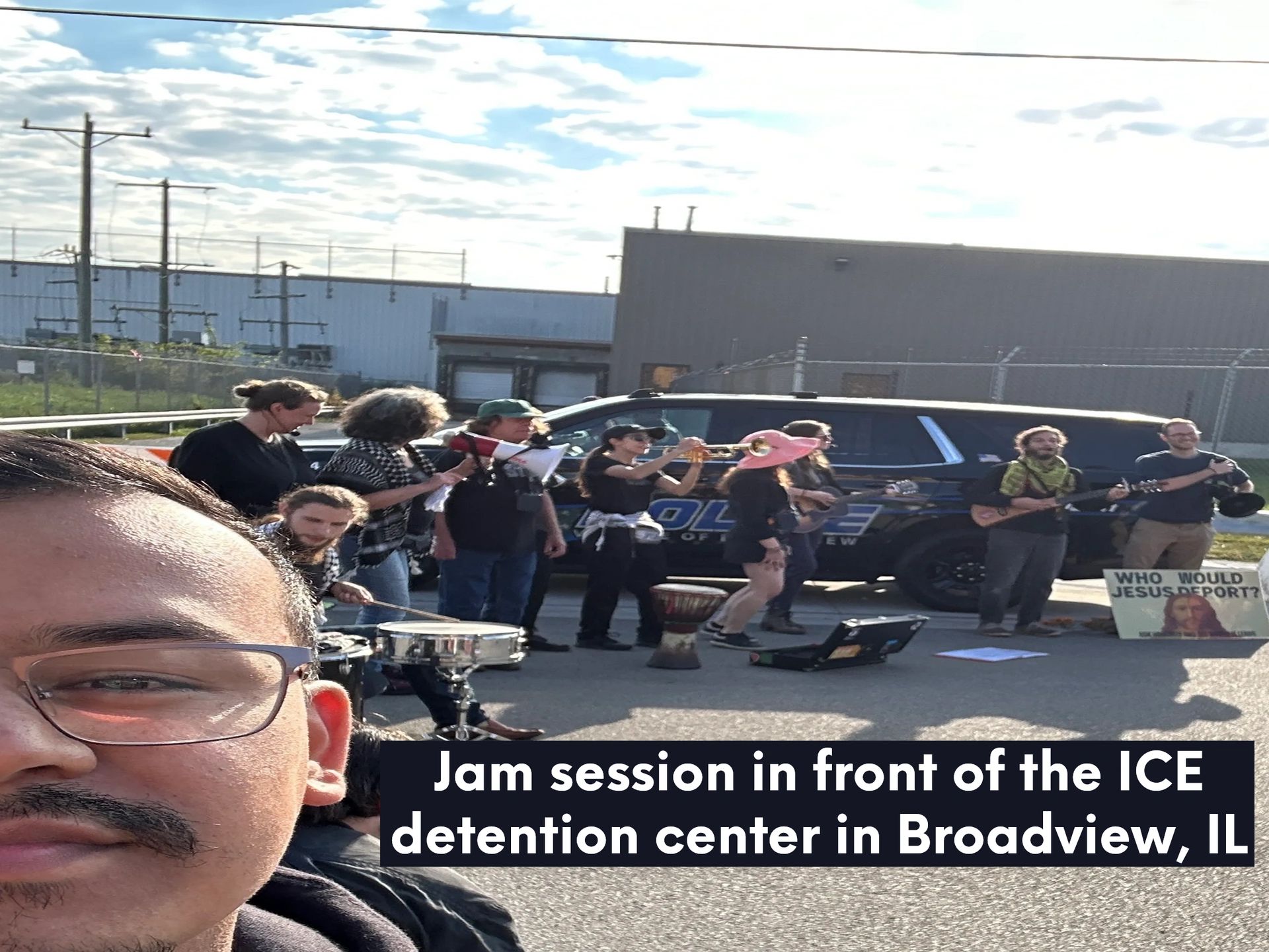 Adair Rodriquez protesting outside the ICE detention facility in Broadview, IL