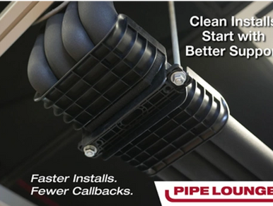Close-up of a pipe clamp securing black pipes, promoting clean installs.
