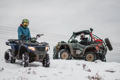 Riders On ATVs In Winter At Lake Benton MN