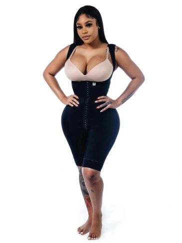 Woman wearing shapewear and posing.