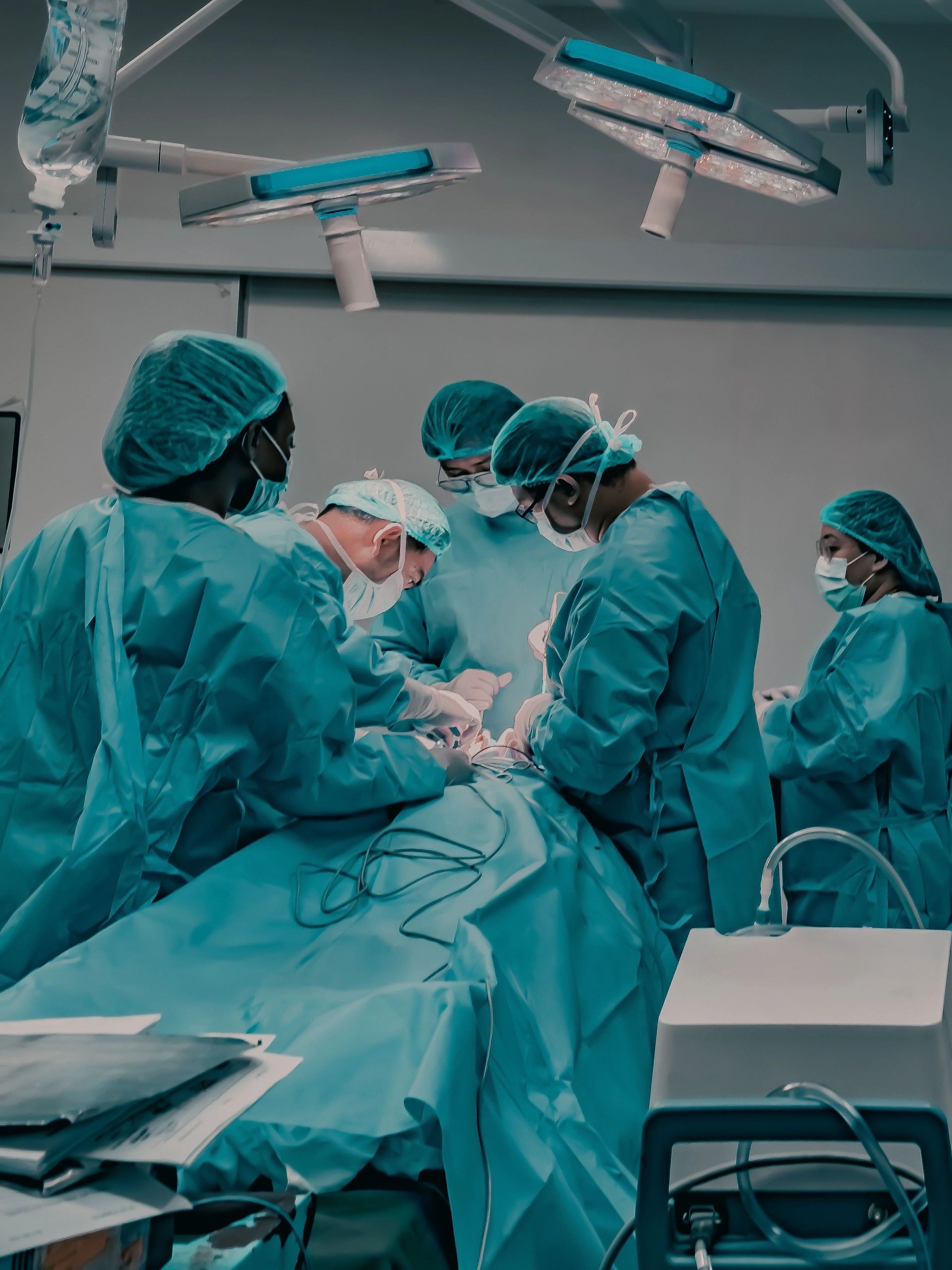Medical team performing surgery in a hospital operating room